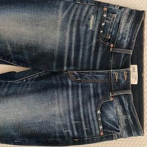 Brand new. Tags taken off. Never worn though.